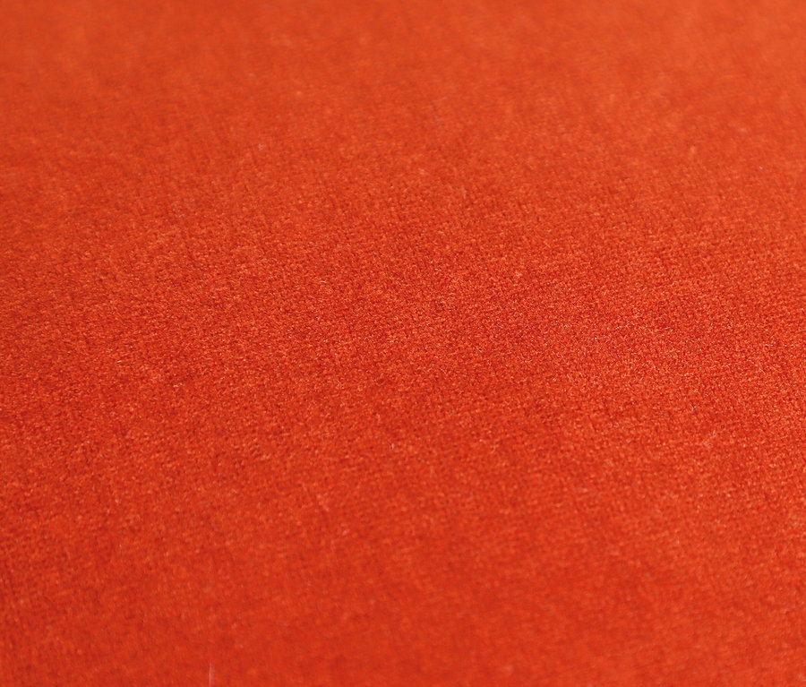 Nahaufnahme eines orangefarbenen Stoffes mit Textur.