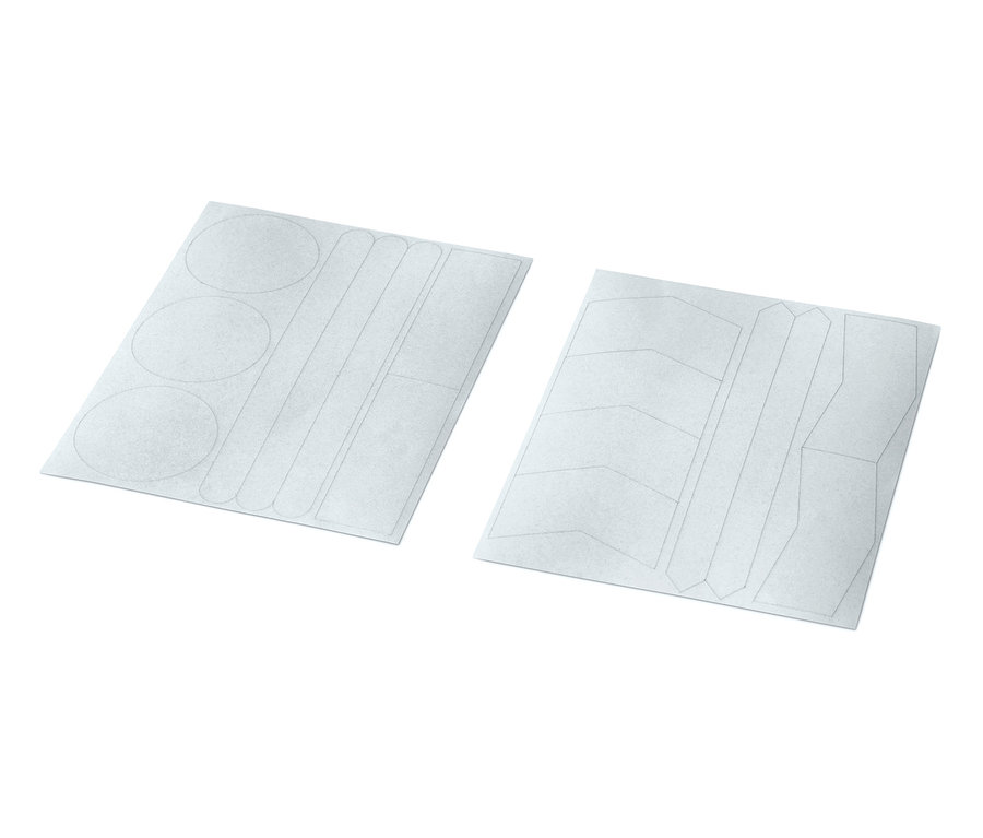 Zwei Bögen reflektierende Aufkleber, 16 Stück insgesamt, mit verschiedenen Formen.