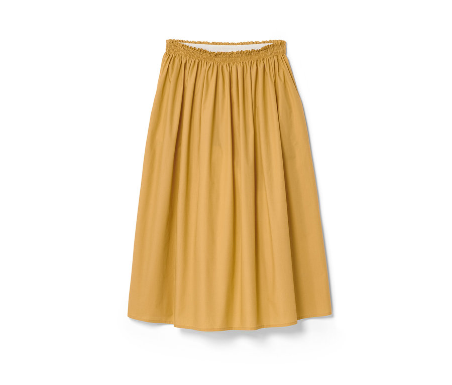 Ein gelber NAH/STUDIO Rock aus Bio-Baumwolle mit Gummibund auf weißem Hintergrund.