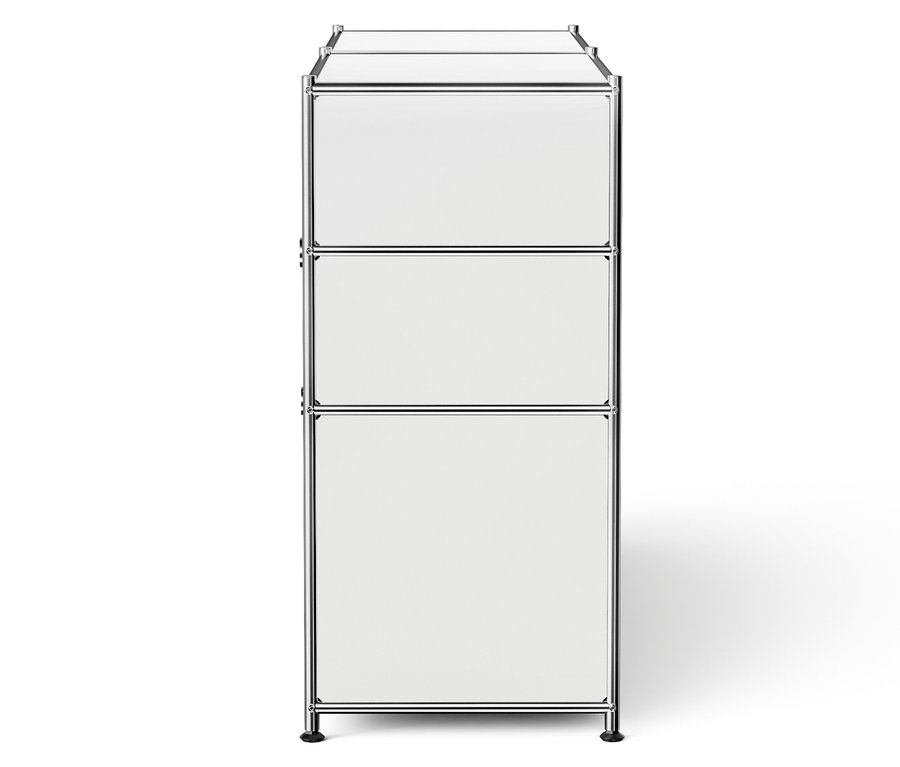 Weißes Aufbewahrungselement mit drei Schubladen und verchromtem Rahmen.