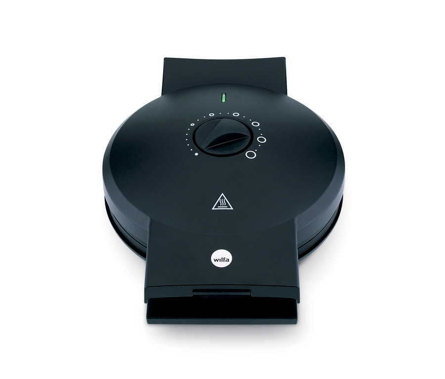 Nahaufnahme eines geschlossenen schwarzen Wilfa ØSTERDAL Krumkakeeisen Waffeleisens.