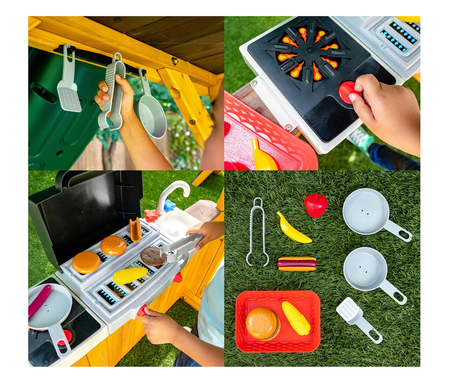 Nahaufnahme eines Kindes, das mit dem Spielturm »Bolzo« und Spielzeugessen spielt.