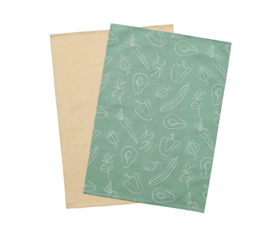 Zwei Geschirrtücher: Eines gelb gestreift, das andere grün mit Gemüse-Muster.