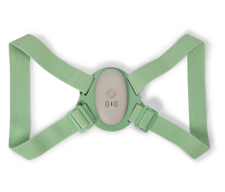 Grüne Haltungskorrektur mit verstellbaren Trägern und digitaler Anzeige auf weißem Hintergrund.
