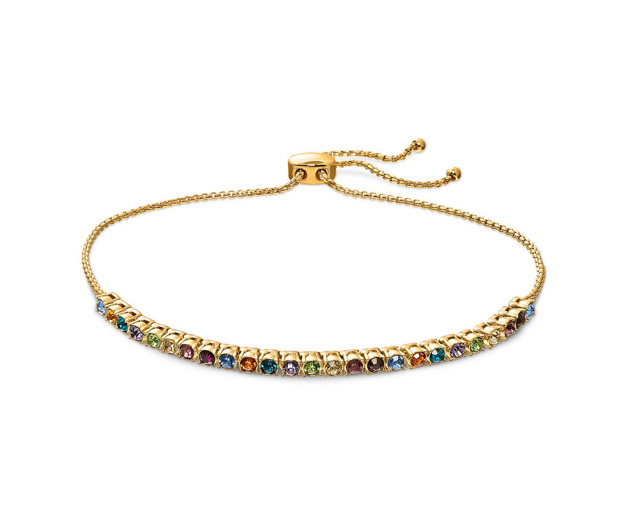 Nahaufnahme eines Armbands Tennis Multicolor mit goldenem Band und bunten Steinen.