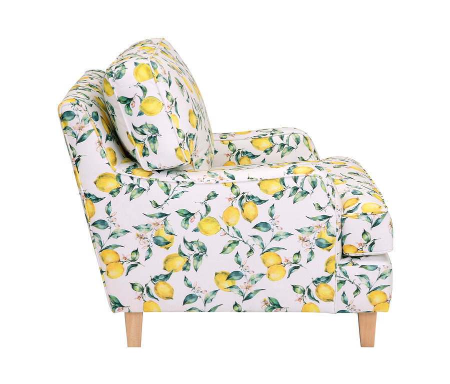 Seitenansicht des Sessels »Penny« mit Zitronen-Print.