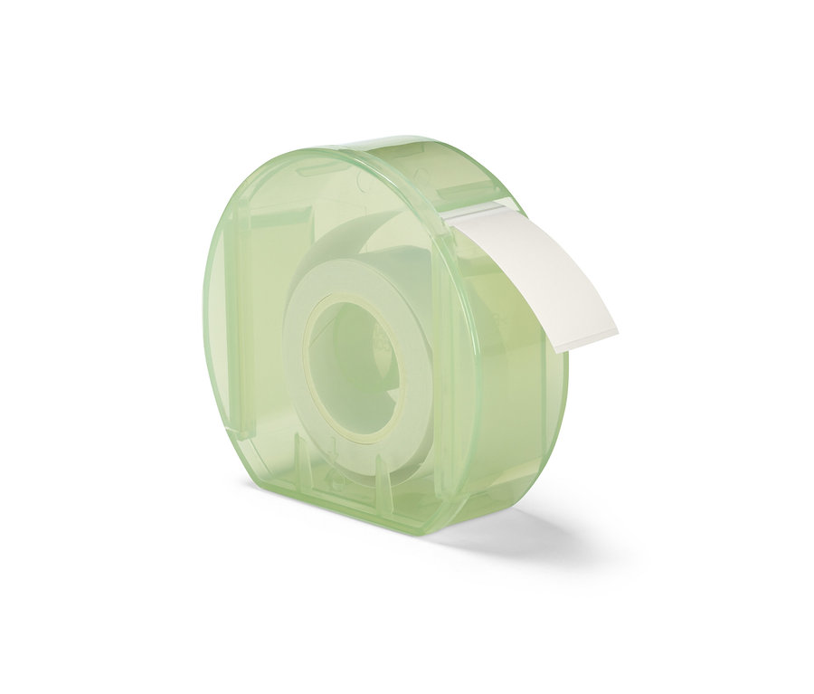 Ein durchsichtiger, hellgrüner Etikettenspender mit einer Rolle weißer Etiketten.