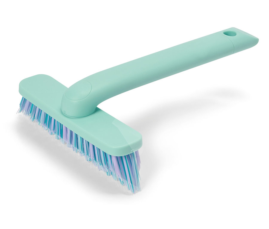 Türkisblaue Schrubbbürste mit blauen und lila Borsten.