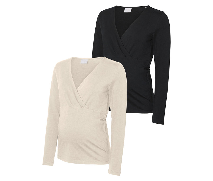 Zwei MAMALICIOUS MLKERRIE TESS LS JRS TOP 2-P NOOS, eines in Beige und eines in Schwarz.
