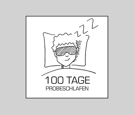 Eine Person liegt mit einer Schlafmaske auf einem Kissen, darüber steht ZZZ.