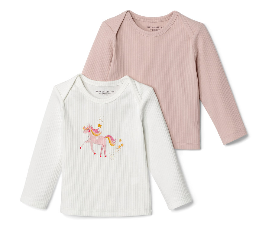 Zwei Baby-Rippshirts: einfarbig rosa und weiß mit Einhorn.