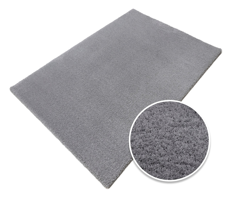 Grauer Teppich »Pleasure« mit Detailansicht der Textur.