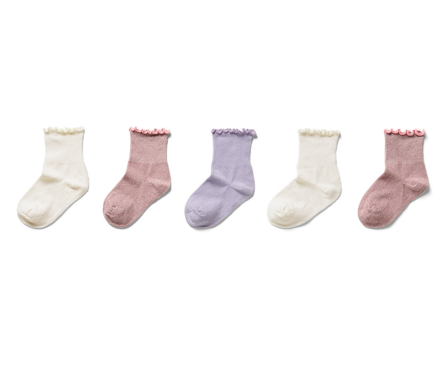 Fünf Paar Kinder-Socken mit Rüschen in Weiß, Rosa und Lila.