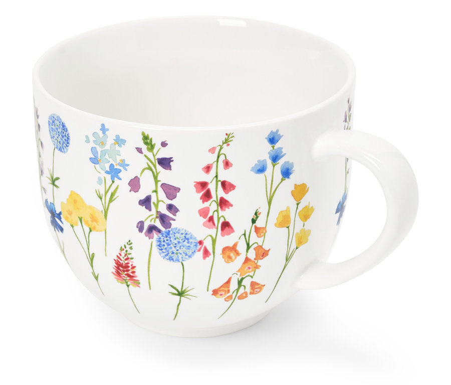 Weiße Tasse mit Blumenmuster.