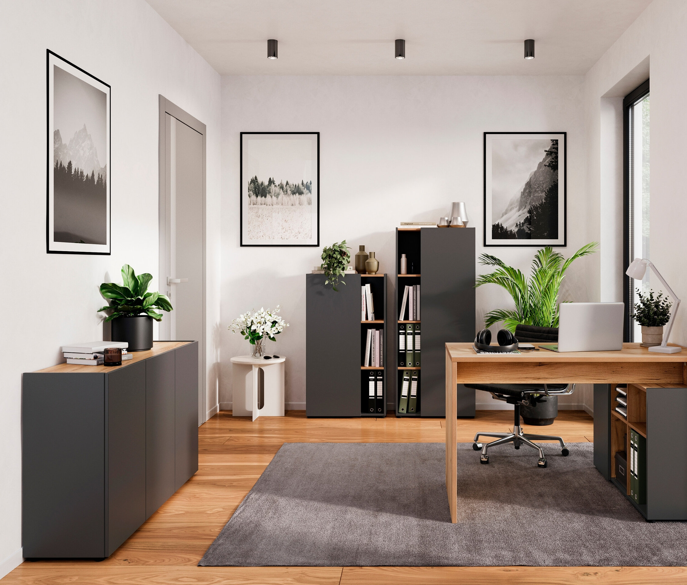 Ein Wohnzimmer mit einem kleinen, graphit-eichenfarbenen Aktenschrank »GW-Adrano« und einem Sideboard »Adrano«.