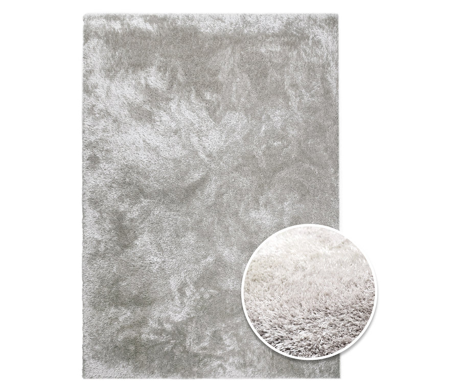 Nahaufnahme eines rechteckigen, cremefarbenen »Silky« Teppichs mit Detailansicht der Textur.