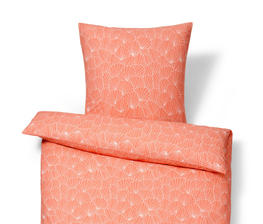 Orangefarbene Renforcé-Bettwäsche in Normalgröße mit weißem Blumenmuster, inklusive Kissen.