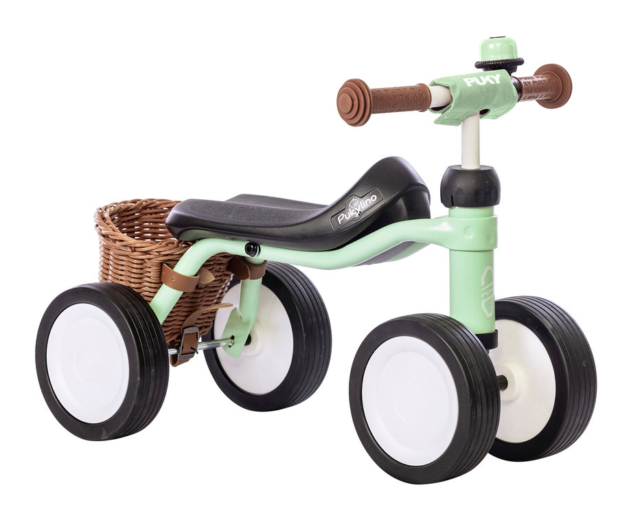 Ein mintfarbenes PUKY Laufrad PUKYLINO BUNDLE mit Korb ist abgebildet.