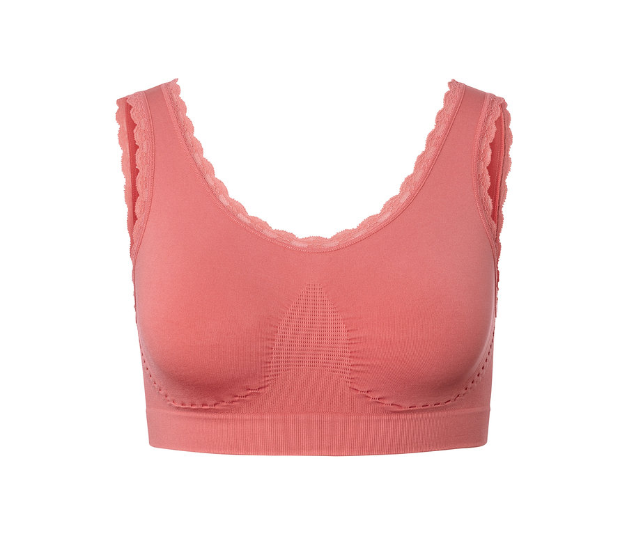 Aprikotfarbenes Seamless-Bustier mit Spitzenbesatz.