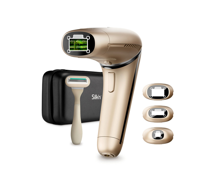 Goldenes Silk'n IPL Haarentfernungsgerät »Silk'n 7«, Rasierer und schwarzes Etui.