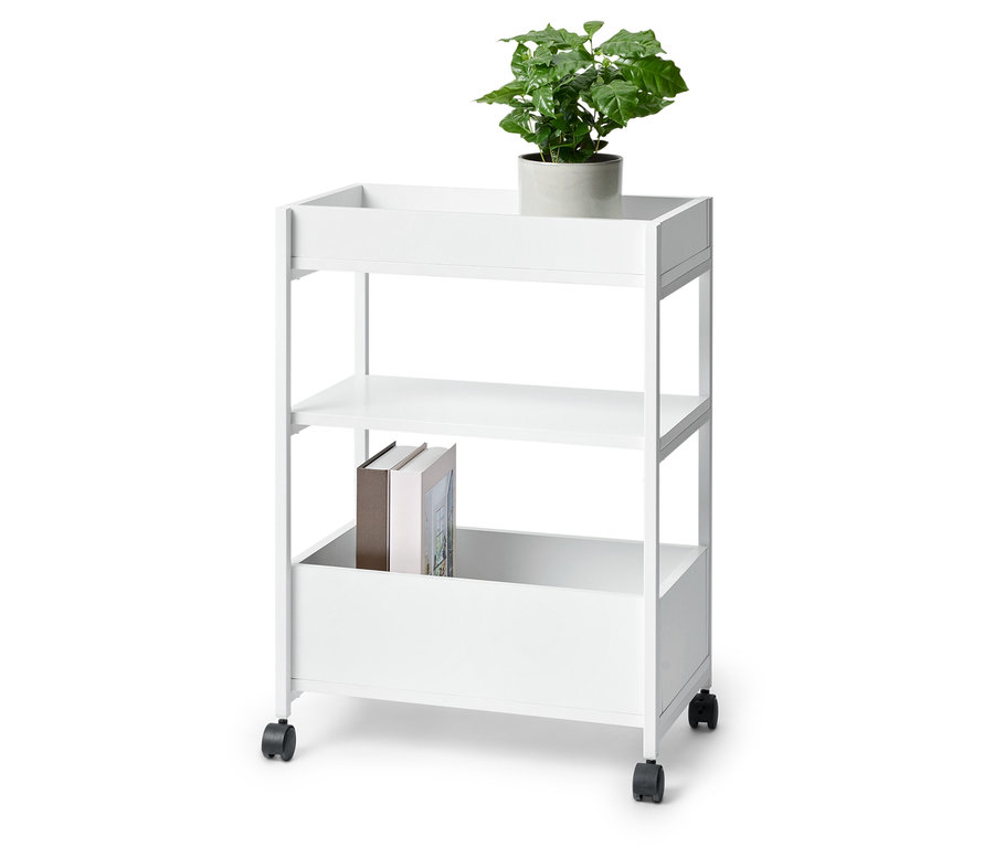 Dreistöckiger, weißer Rollwagen. Auf der obersten Ablage befindet sich eine grüne Pflanze in einem grauen Topf, auf der mittleren Ablage befinden sich Bücher.
