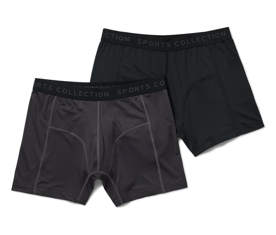 Zwei Herren-Boxershorts: eine schwarze und eine dunkelgraue.