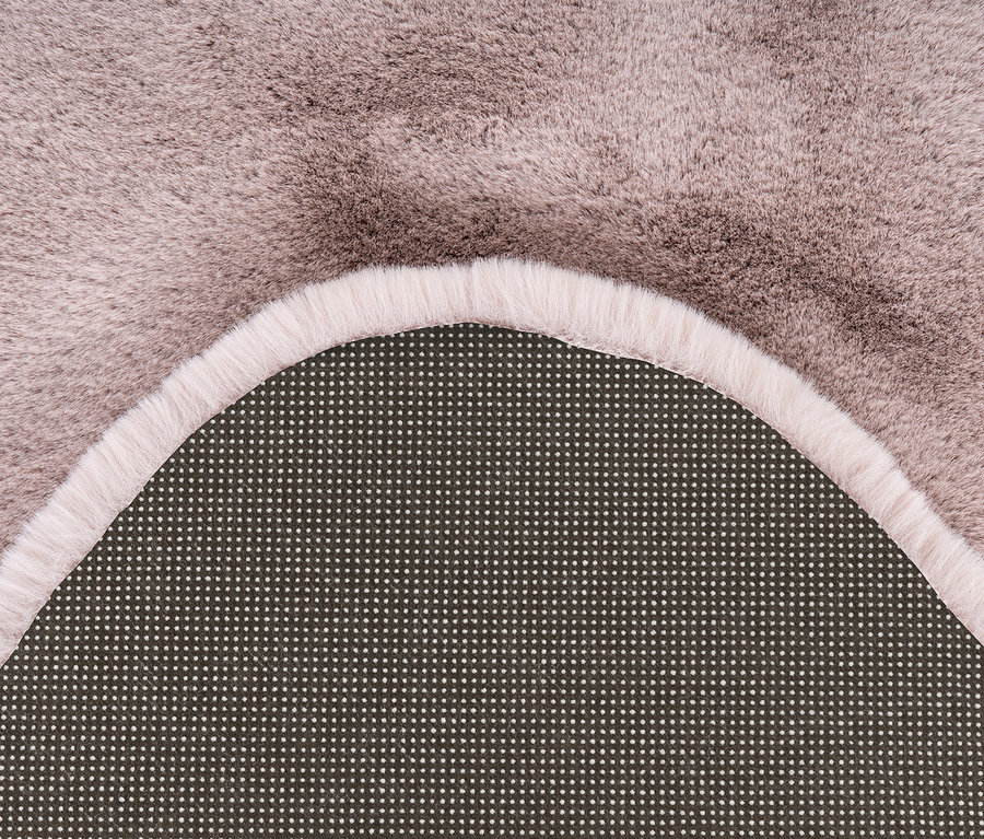 Detailansicht eines Kayoom Deko-Kunstfell »Rabbit Sheepskin 200«, die Textur und Rand zeigt.