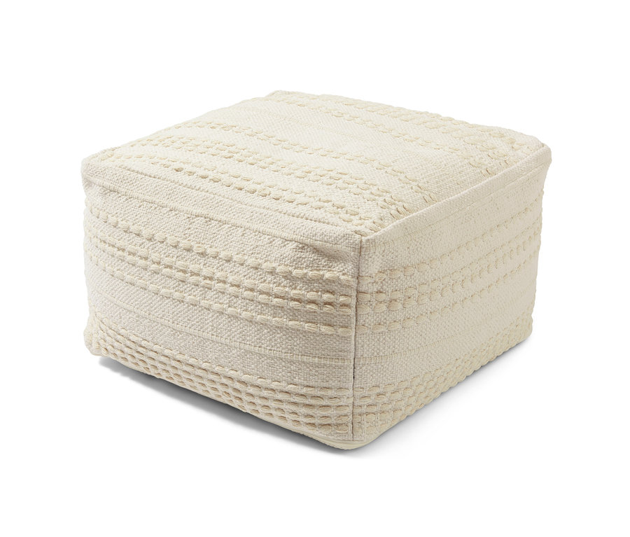 Ein beiger Sitzpouf.
