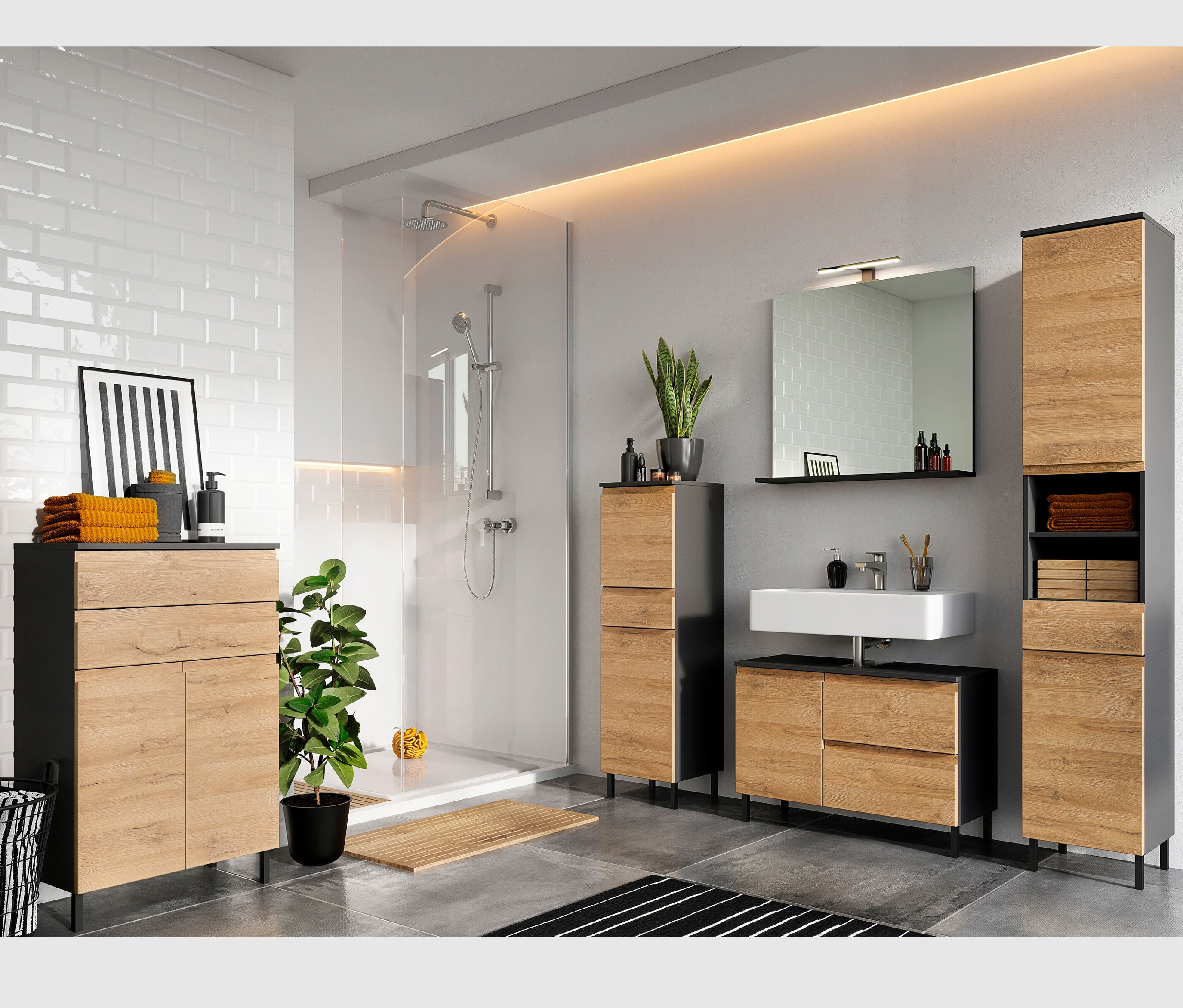 Badezimmer mit Waschbecken, Spiegel und Salinas Möbeln in Graphit/Eiche.