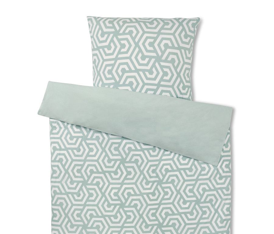 Bettwäsche-Set mit geometrischem Muster in Weiß und Grün.