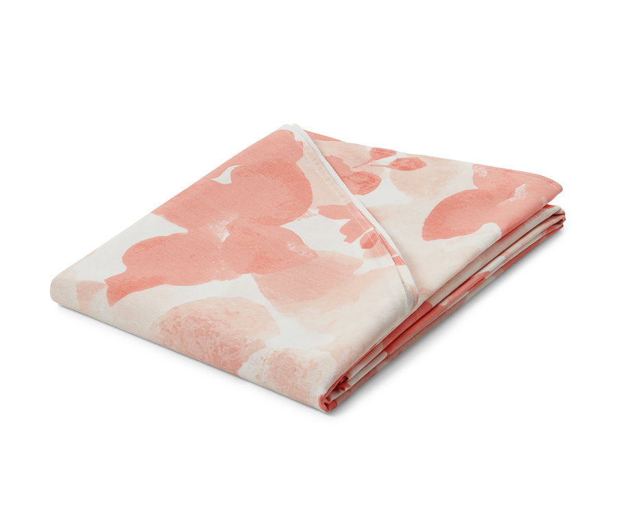 Gefaltete ovale Outdoor-Tischdecke mit lachsfarbenem Blumenmuster, ca. 160 x 220 cm.