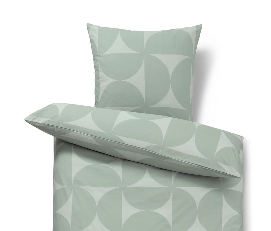 Grüne Renforcé-Bettwäsche mit geometrischem Muster.