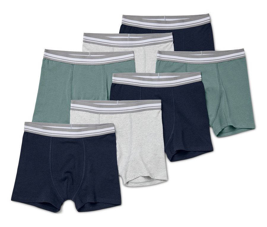 Sieben Kinder-Slipboxer in verschiedenen Farben liegen auf einem weißen Hintergrund.