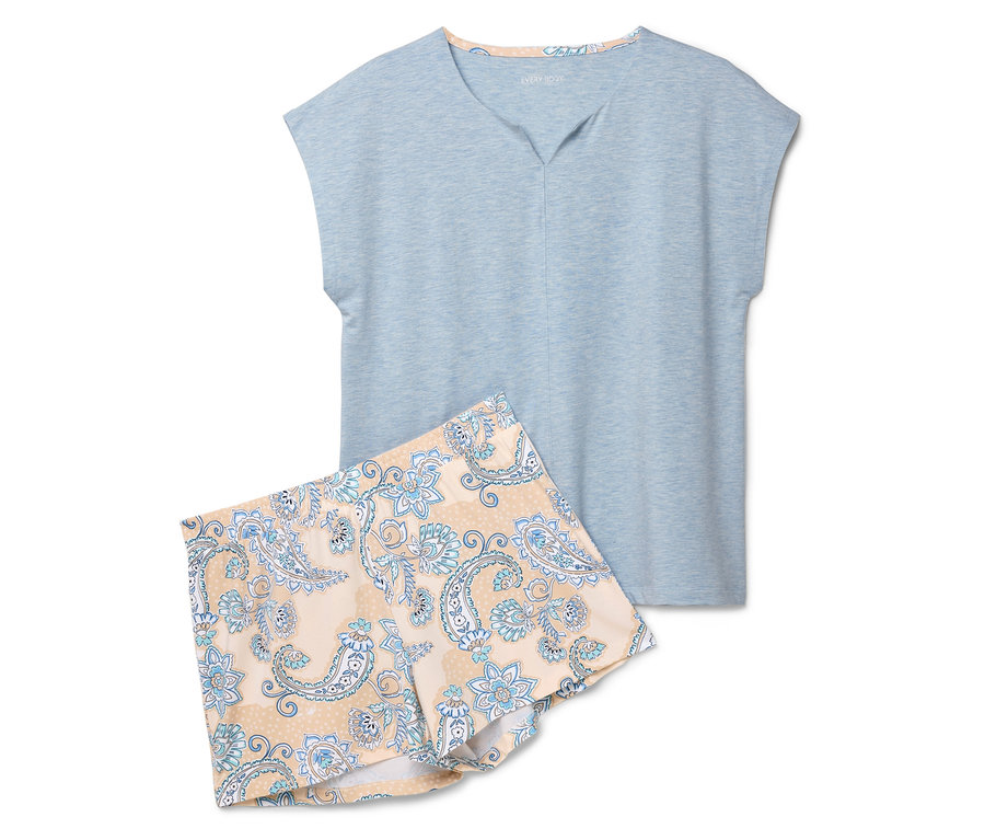 Ein hellblaues Schlafanzugoberteil und Shorts mit Pfotenabdruckmuster liegen auf einem weißen Hintergrund.