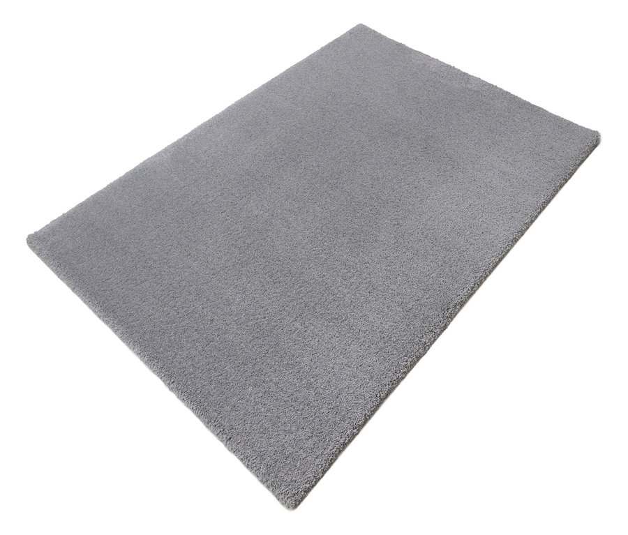 Nahaufnahme eines hellgrauen Teppichs »Pleasure«.