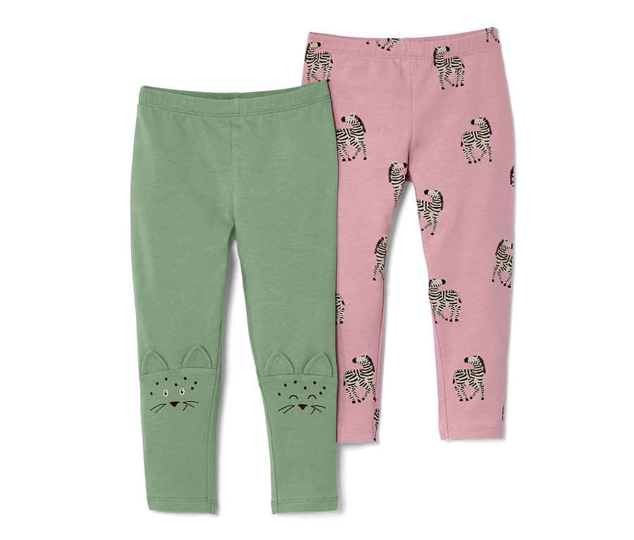 Zwei Kinder-Leggings: eine grüne mit Katzenmotiven an den Knien und eine rosa mit Zebramuster.
