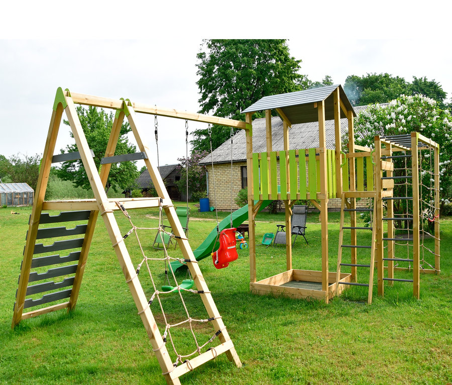 Wendi Spielplatz »Dino« aus Holz mit Rutsche, Schaukel und Klettergerüst auf einer grünen Wiese.
