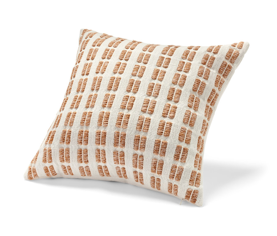 Dekokissen mit beige-weissen Streifen.