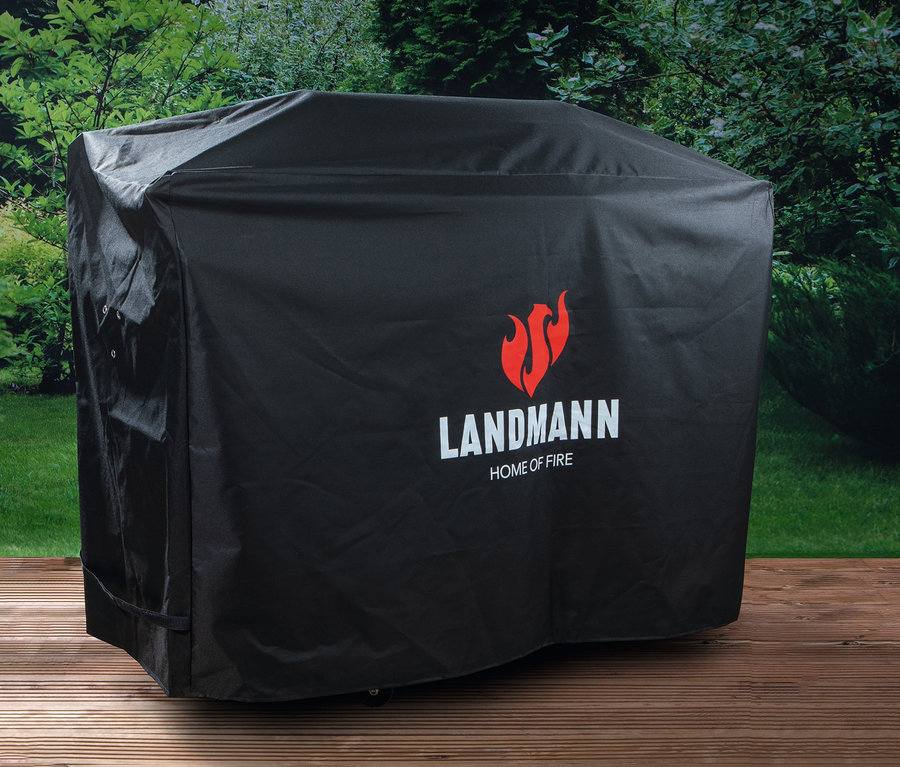 Schwarze Landmann Abdeckhaube für Grill auf Holzterrasse.