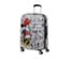 Ein mittelgroßer American Tourister Wavebreaker »Minnie Mouse« Koffer mit Comic-Mickey-Mouse-Aufdruck, ausziehbarem Griff und vier Rädern.