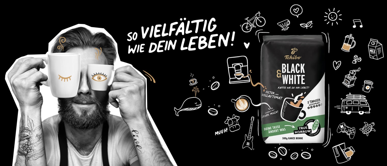 black & white: Mann hält Tassen vor seine augen','Enter picture alt'}