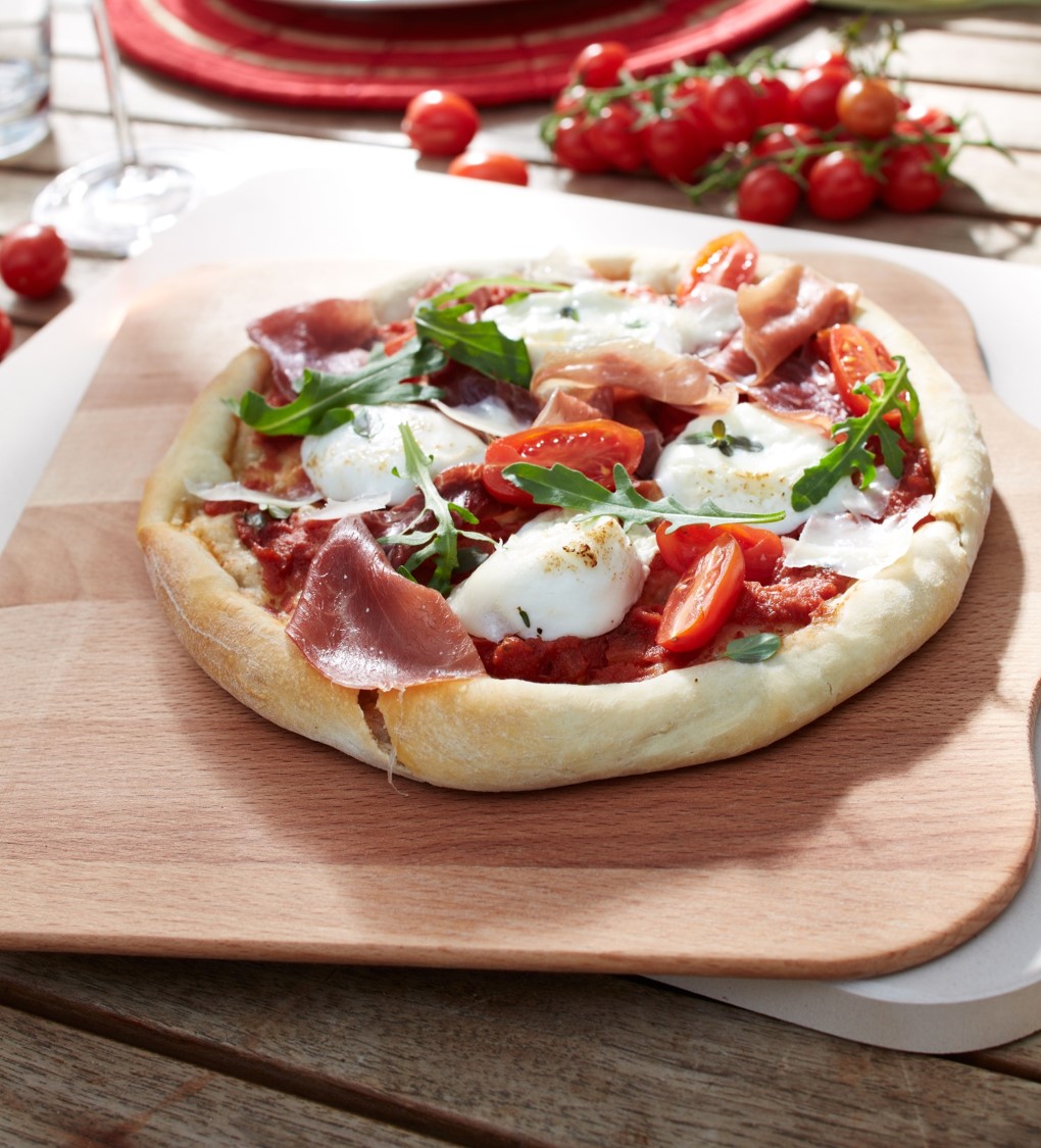 Pizza mit Rucola und Parmaschinken Rezept